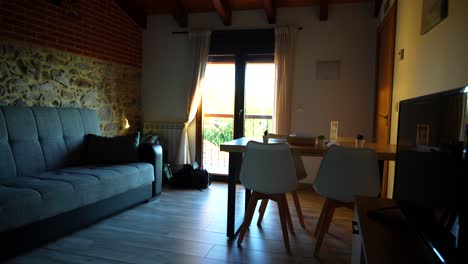 cozy apartment with balcony and stone wall