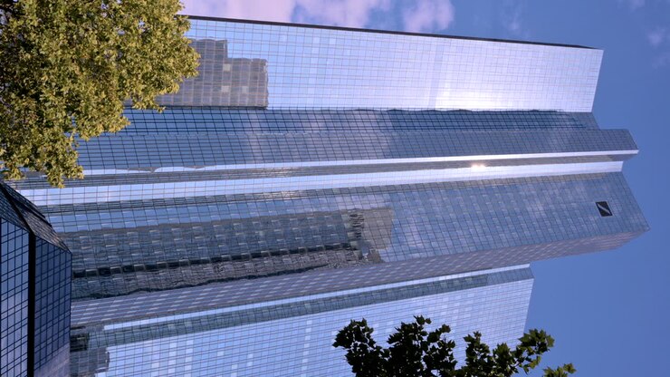 Fráncfort, Alemania - 13 de noviembre de 2022: Vista de ángulo bajo de las Torres Gemelas del Deutsche Bank en Fráncfort, Alemania. Vertical