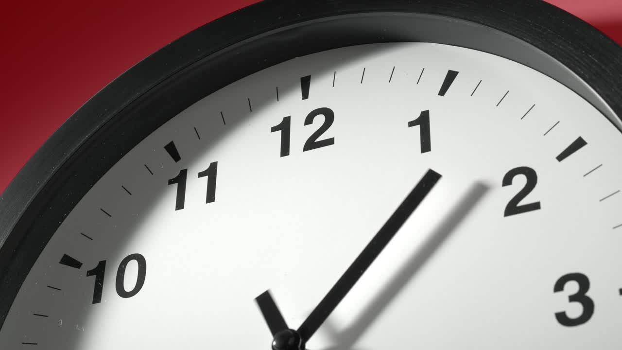 Clock Face on Burgundy Cherry Red Wall in Time Lapse