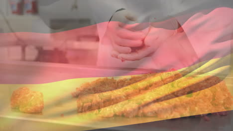 preparing food, chef adding german flag animation over fried dish in kitchen