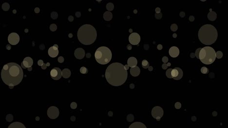 animation of light spots falling on black background