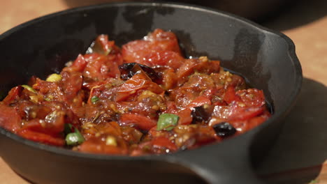 delicious salsa in a sauce pan. close up