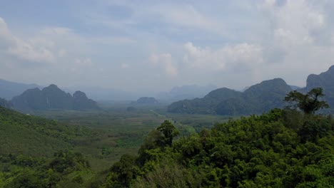 revealing drone footage of tropical valley, khao sok thailand