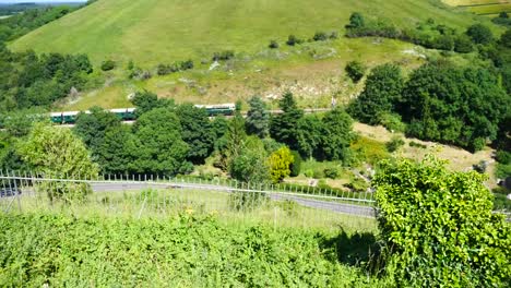 a train going through the countryside from above