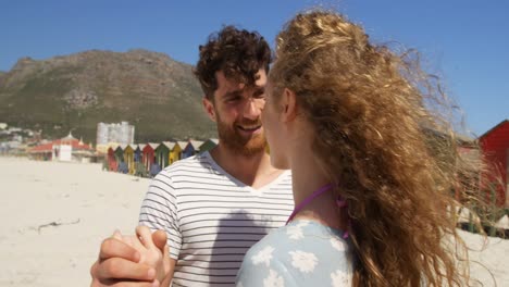 romantic couple dancing together at beach 4k