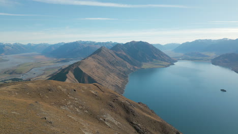 Lake-Coleridge-And-Surrounding-Mountains-In-Canterbury-New-Zealand-Drone-Pan-Right