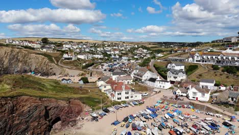 aerial view of boats at hope cove beach at low tide