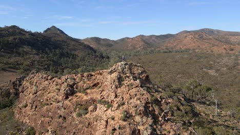 man on hilltop willow creek, looking wilderness landscape, flinders ranges