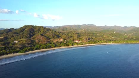 Aerial-view-of-Samara-Beach-and-town-in-the-Guanacaste-Province,-Costa-Rica