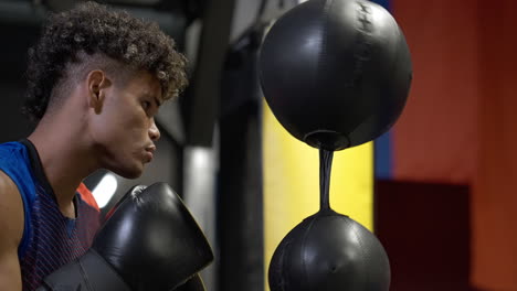 man boxing in a gym