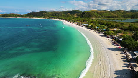 aerial over one the sandy of tanjung aan beach near kuta, lombok island, indonesia