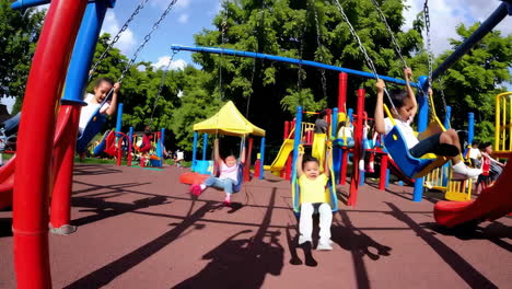 children playing at a colorful playground