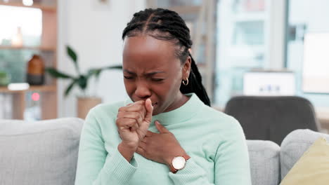 cough, sick and black woman on a sofa with sore