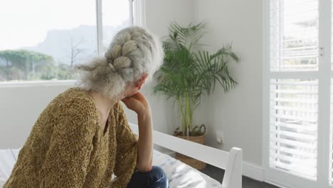 caucasian senior woman feeling bad, having headache