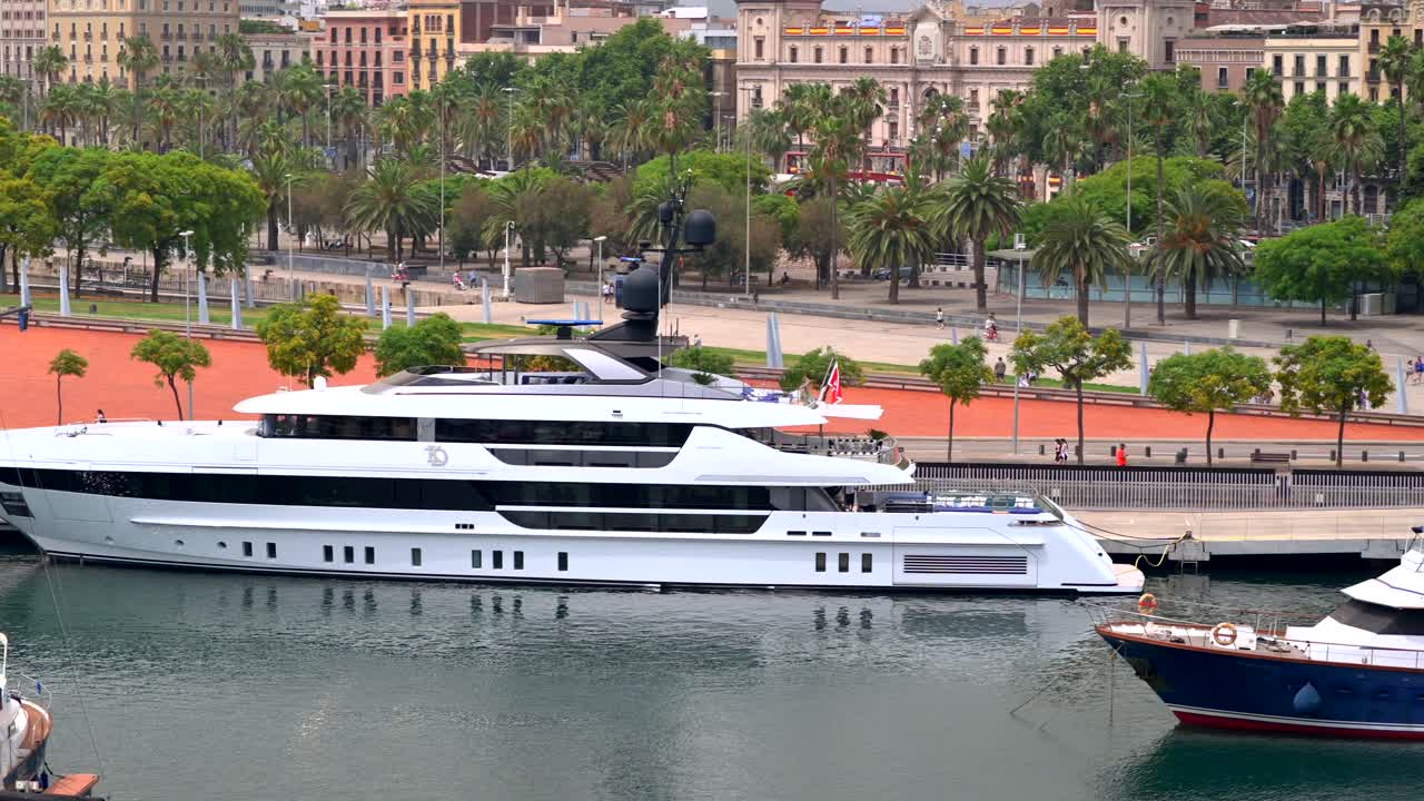Aerial drone view of boats docked in the Port Vell in Barcelona, Spain