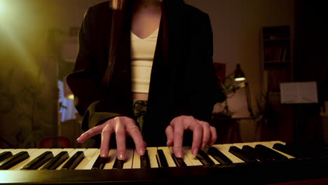 woman playing keyboard