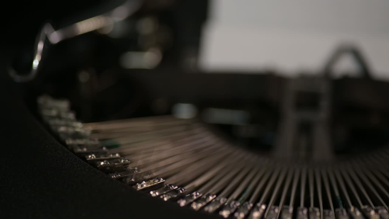 Macro typebars of vintage typewriter, retro type writing