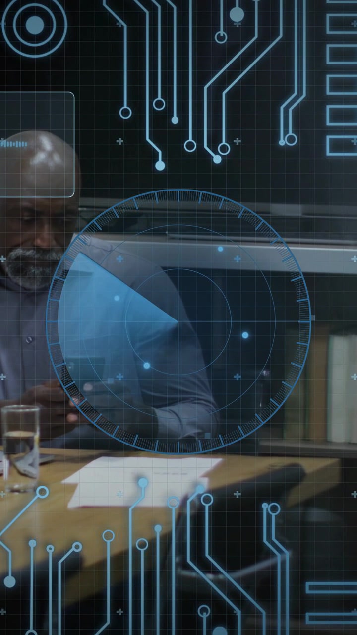 Vertical video: Man tapping phone at table, activating rotating HUD while checking business papers