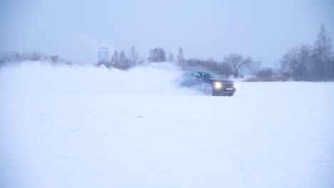 car drifting on snowy ice