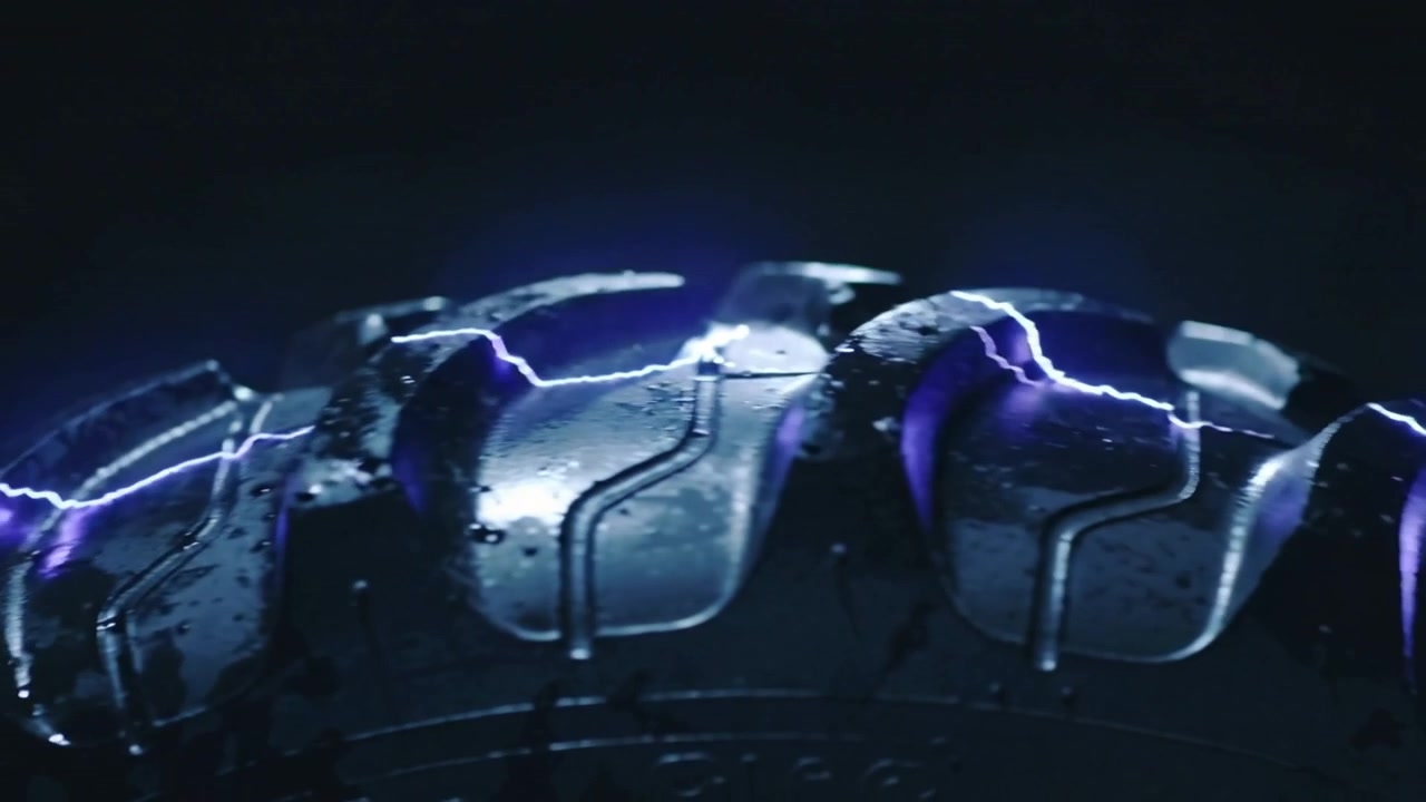 Igniting at left edge purple-blue arc tracing wet tire tread on studio, highlighting lugs