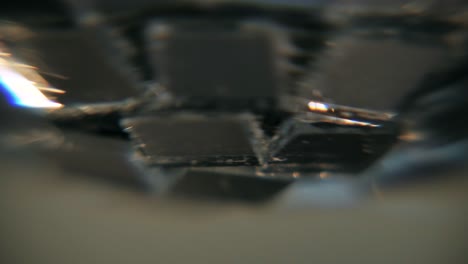 disco ball spinning anticlockwise direction, macro shoot