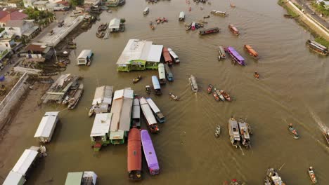 aerial view of cai rang floating market, at song can tho river in mekong delta, vietnam