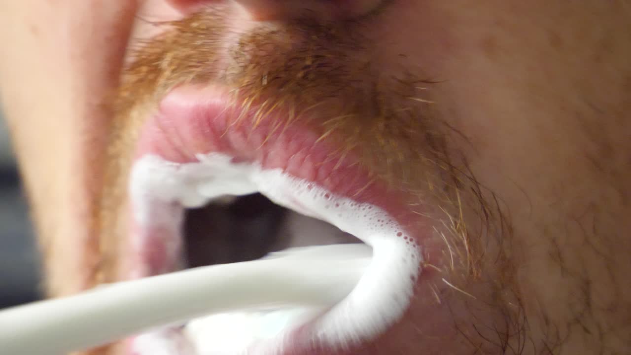 Dental Hygiene, Close up of white man brushing his teeth with toothbrush