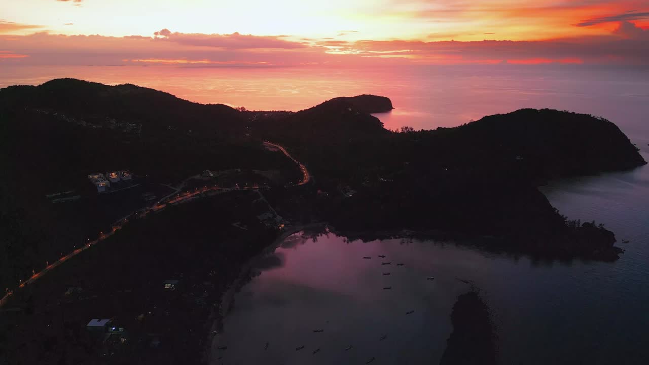Golden Horizon Sunset Aerial View of Koh Pha Ngan’s Beach and Mountain Landscape