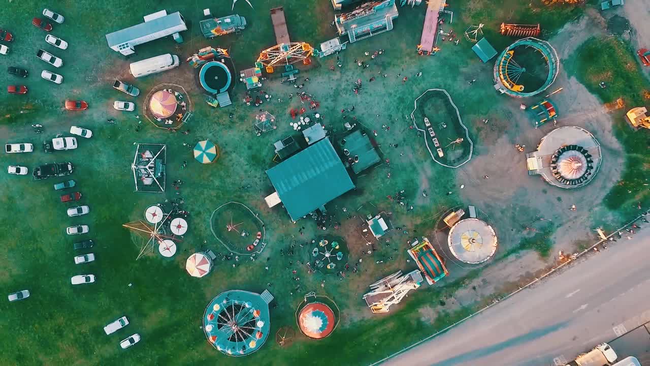 Aerial top drone shoot of a carnival in the sunset