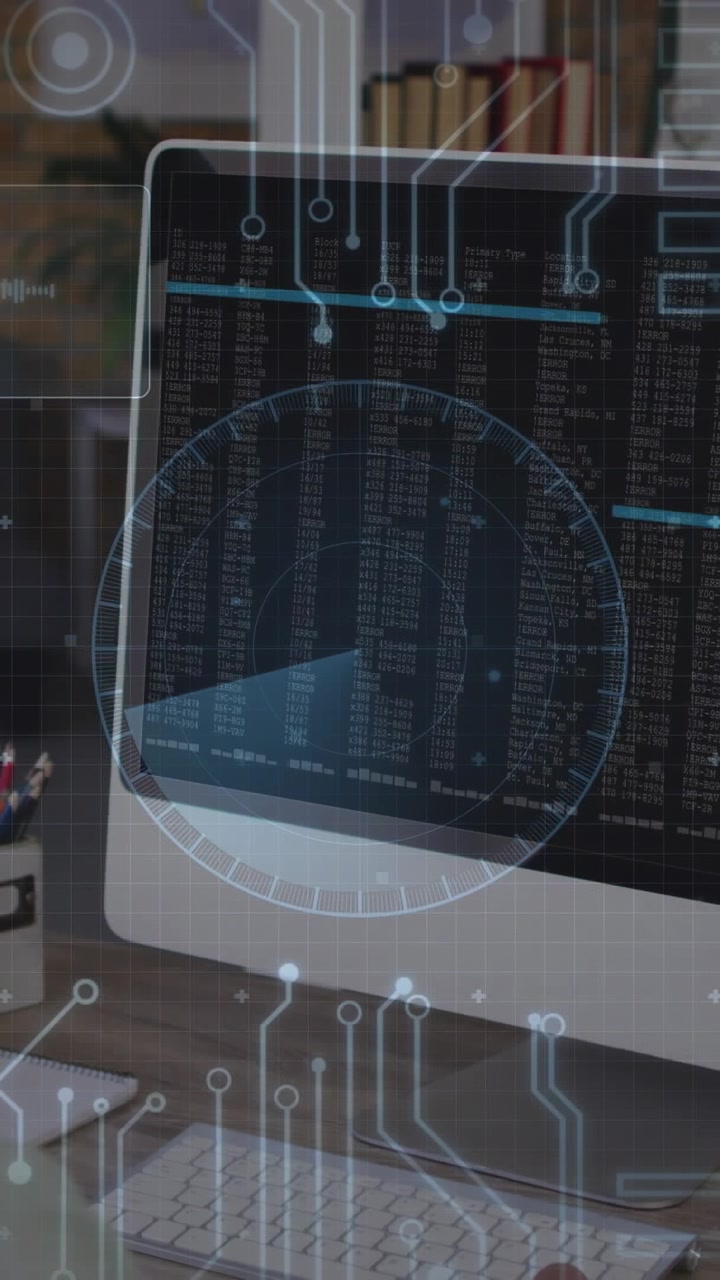 Desk monitor showing HUD overlay and starting rotating radar, marking data rows for tech monitoring