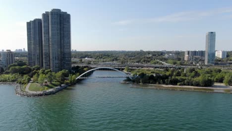 flying towards the gardiner expressway on a sunny day on lake ontario just outside of toronto