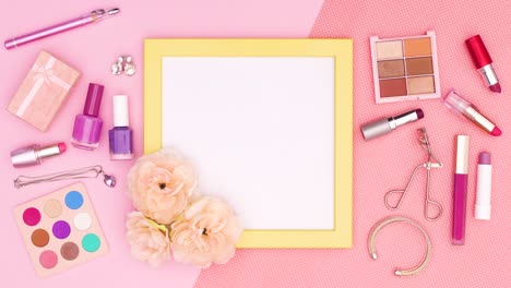 make up products appear around yellow frame for text on pink theme. stop motion