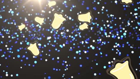 multiple christmas bell icons falling against blue spots of light against black background