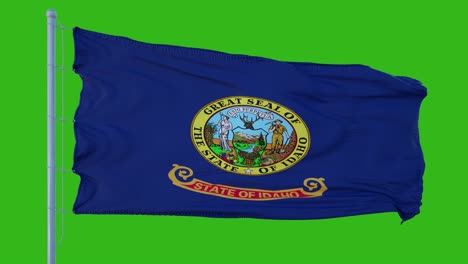 state flag of idaho waving in the wind against green screen background