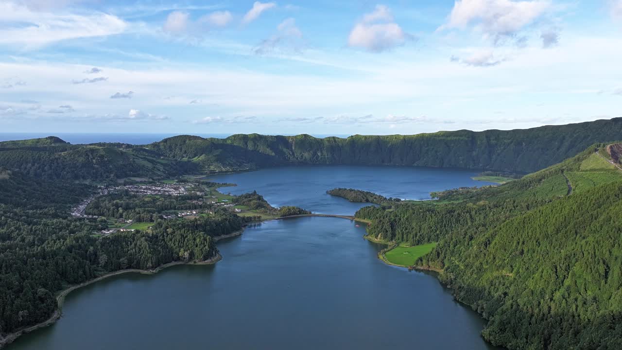 Scenic drone hyperlapse view of clouds and shadows over Sete Cidades lagoon