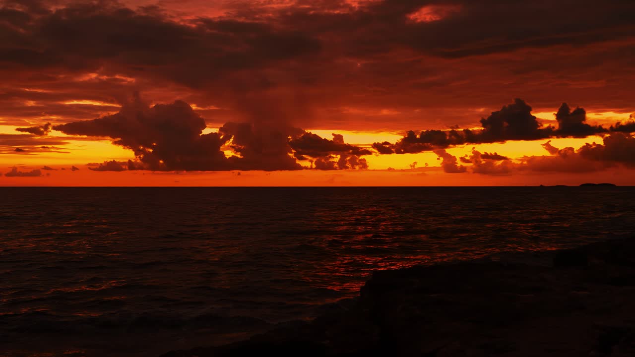 Red sky sunset over the Adriatic Sea at Istria Croatia in a cinematic slow motion