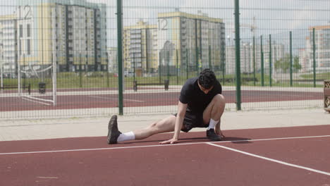 brunet man stretching