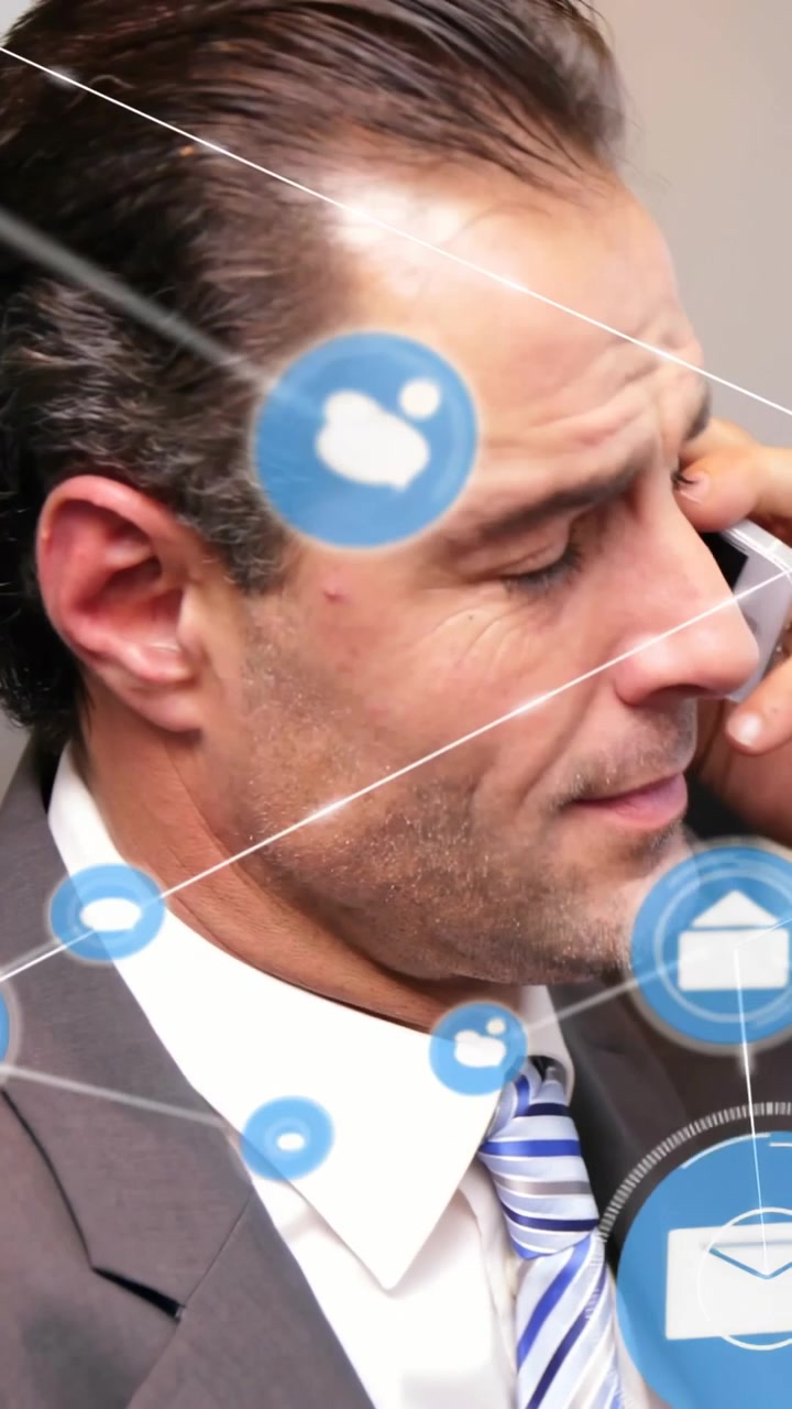 Vídeo vertical: Executivo atendendo ao telefone com ícones animados de rede de negócios ao seu redor.