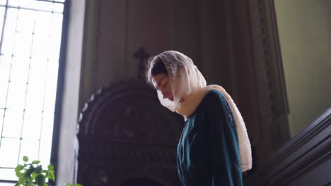 woman with veil at the church