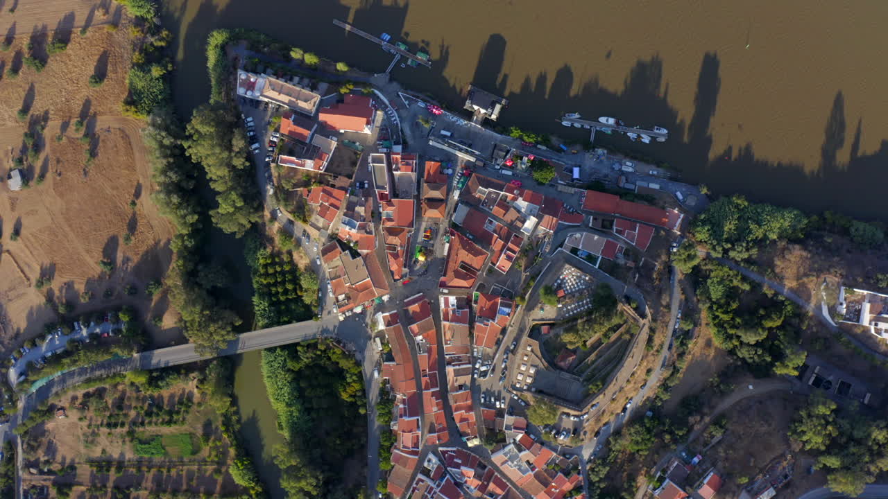 Top Down Drone Shot of Alcoutim Village and Castle Walls near River