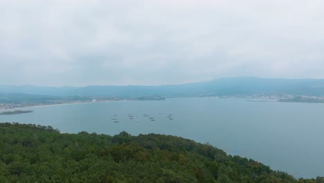 Flying-Towards-Bateas-And-Village-Of-Baiona-,-Vigo,-Galicia,-Mirador-De-Monteferro,-Spain