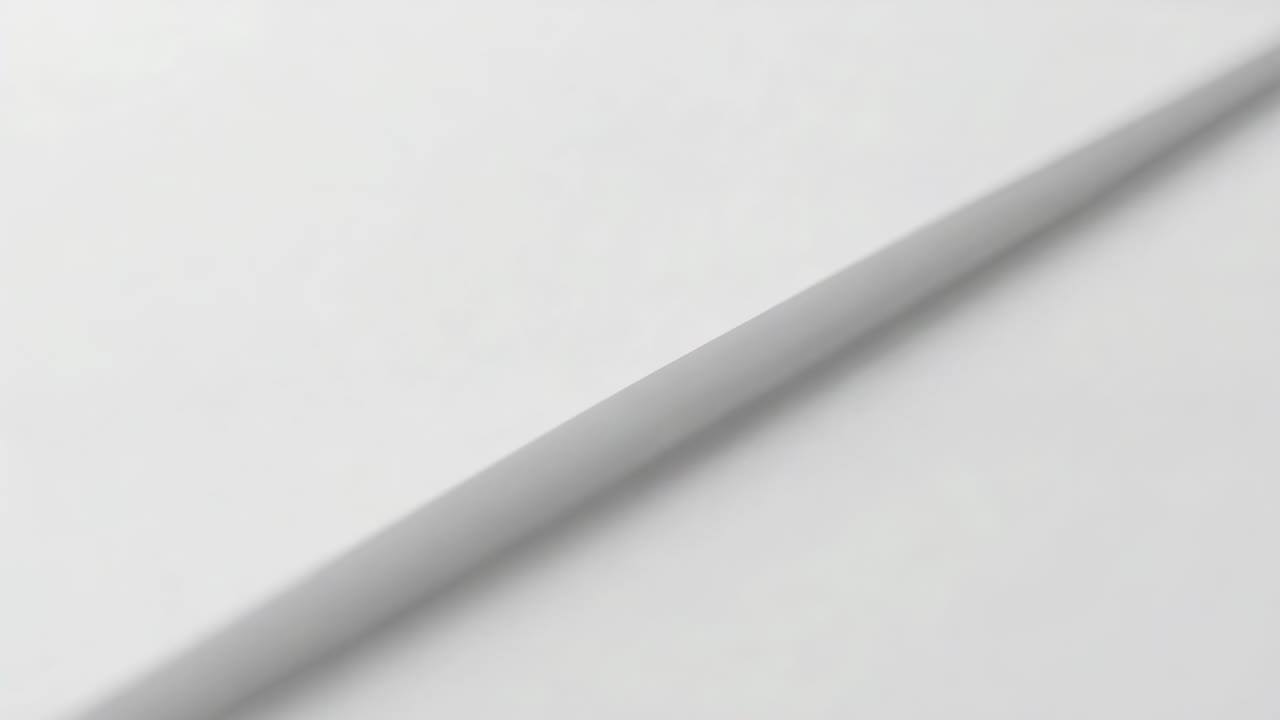 Revealing thin diagonal strip becoming clear on white table, camera pulling focus showing smudges