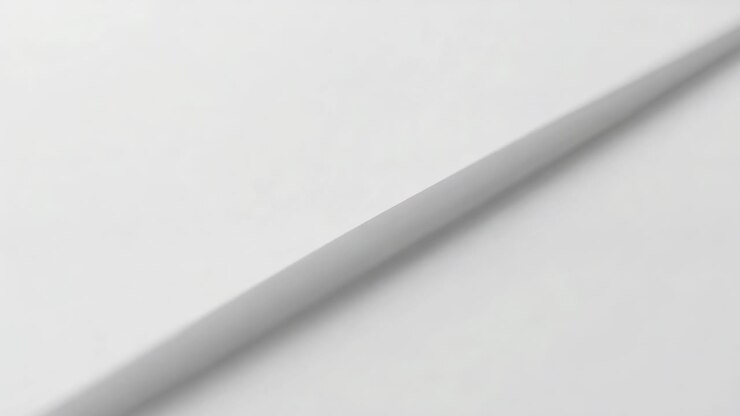 Revealing thin diagonal strip becoming clear on white table, camera pulling focus showing smudges