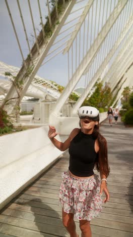 woman experiencing vr in a modern urban park