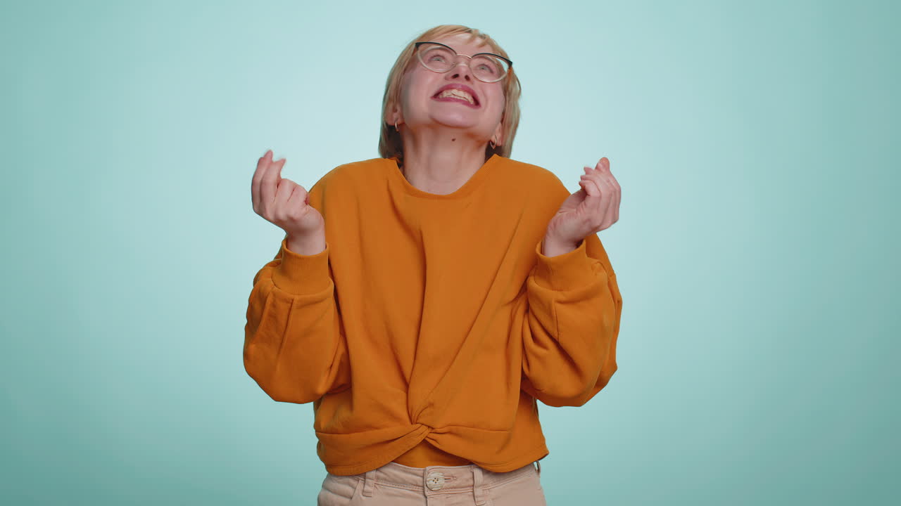 Woman showing wasting throwing money around more tips big profit winning lottery jackpot shopping