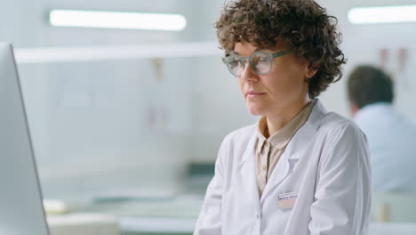 female doctor using computer at work