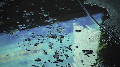 water reflection on asphalt concrete road during the night