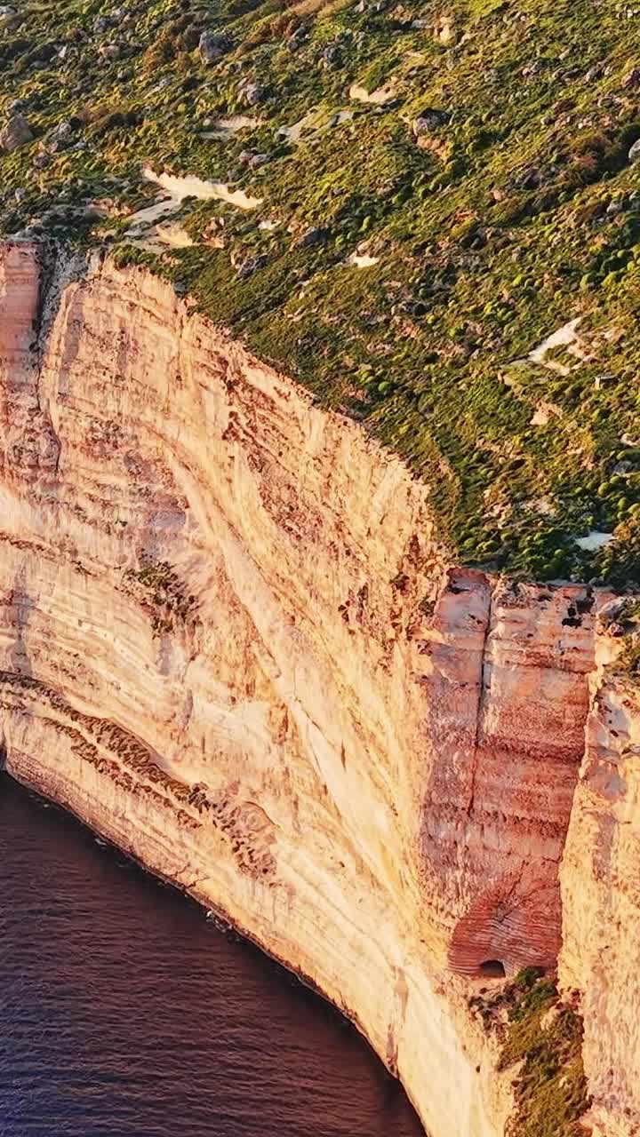 Cliffs and shoreline view of Malta during daytime