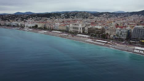 Touristic-Seaside-Beach-Town-of-Nice,-France-on-Mediterranean-Sea-and-French-Riviera-Coastline,-Aerial-Drone-View