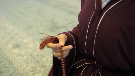 woman hands rosary